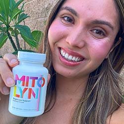 Happy and energized woman after using Mitolyn to improve her health and wellness, with increased energy and mental clarity.